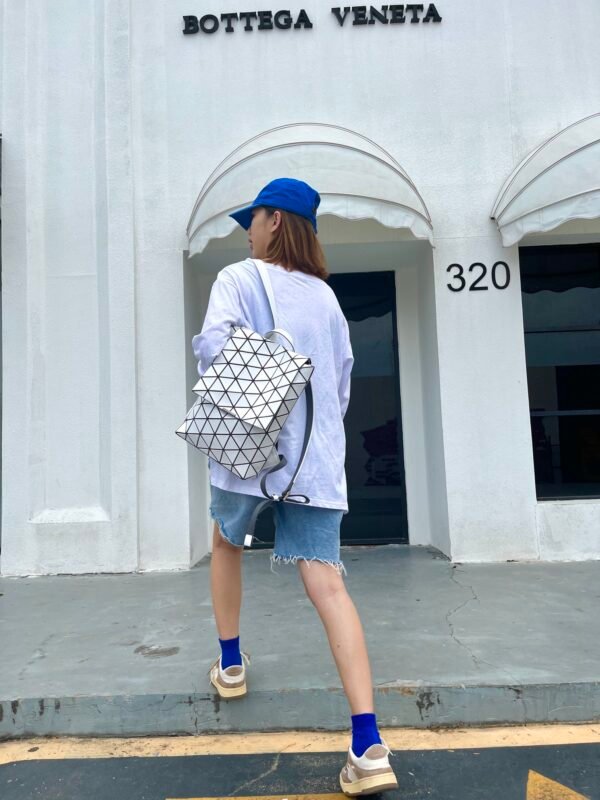 ISSEY MIYAK new series with a minimalist silhouette and long flap design, flap crystal backpack