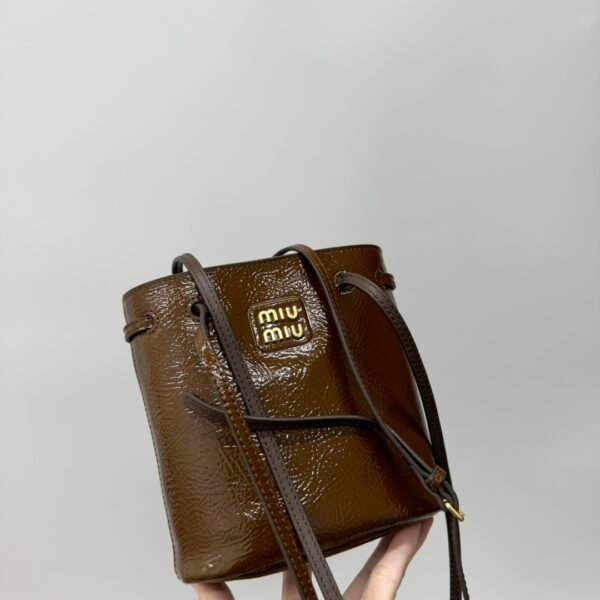 MiuMi drawstring bucket bag waxed leather