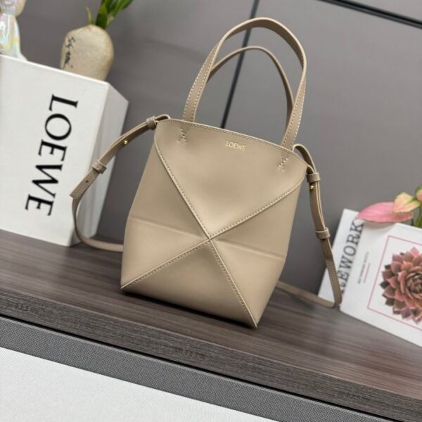 L⊚℮w℮New 🆕Mini shiny cow leather Puzzle Fold handbag